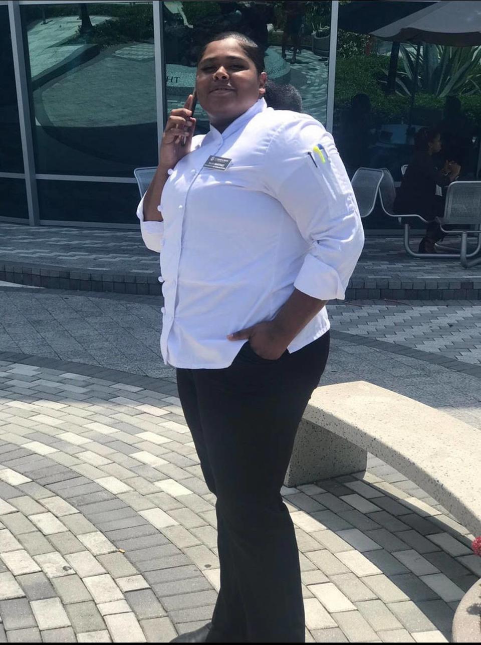 Najai Martinez, a 23-year-old rising senior at Johnson & Wales North Miami and the president of the JWU Student Government Association from Palm Coast, Florida, poses on campus.