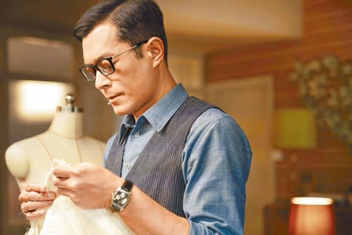 Louis Koo plays the role of Anita's image designer and mentor Eddie