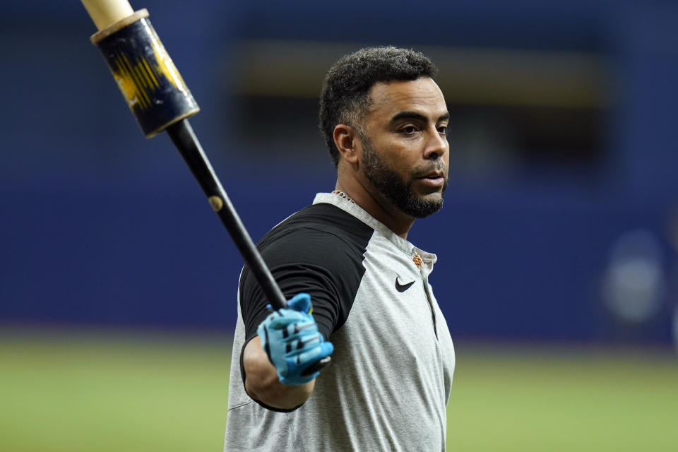 Tampa Bay Rays' Nelson Cruz swings a bat as he waits his turn in the batting cage during an American League Division Series baseball practice Wednesday, Oct. 6, 2021, in St. Petersburg, Fla. The Rays play the Boston Red Sox in the best-of-five series. (AP Photo/Chris O'Meara)