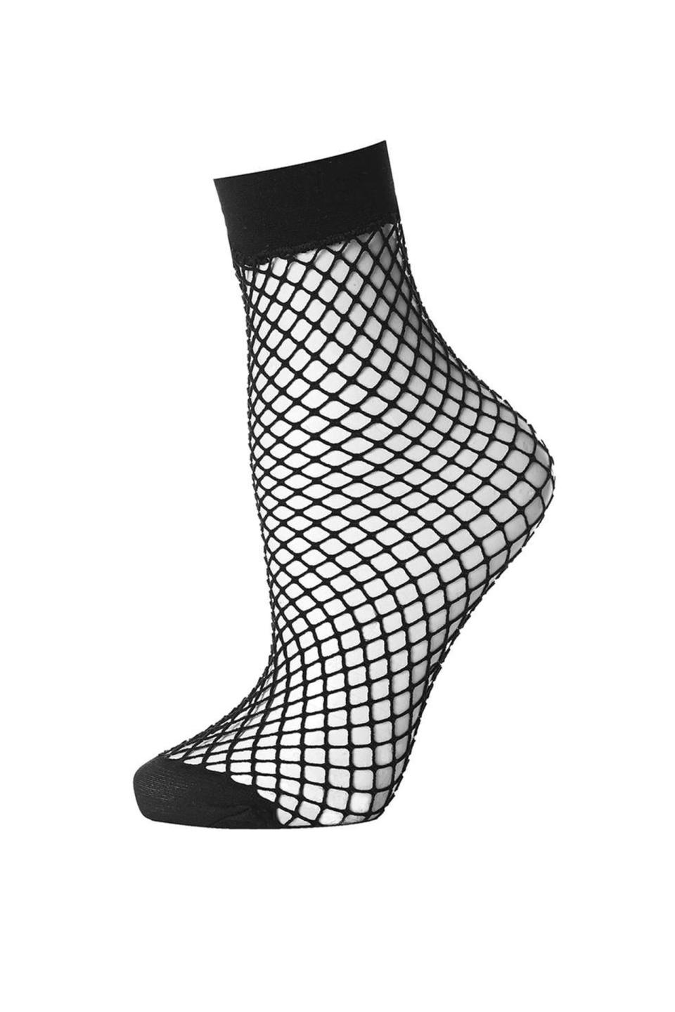 <p>Topshop Fishnet Ankle Sock, $8; <a rel="nofollow noopener" href="http://us.topshop.com/en/tsus/product/fishnet-ankle-sock-5688292?bi=0&ps=20" target="_blank" data-ylk="slk:topshop.com;elm:context_link;itc:0;sec:content-canvas" class="link ">topshop.com</a></p>