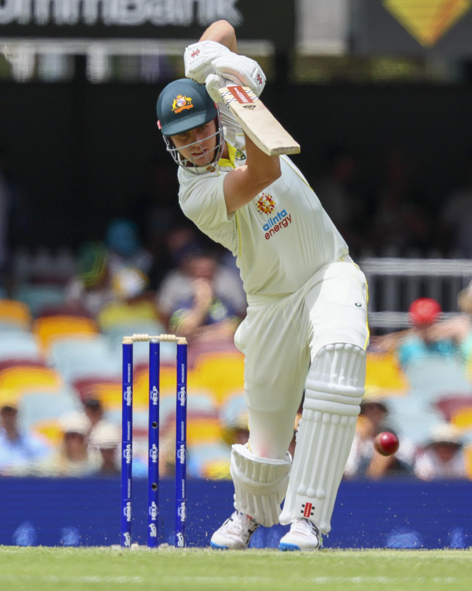 Australia's Cameron Green bats during day two of the first cricket test between South Africa and Australia at the Gabba in Brisbane, Australia, Sunday, Dec.18, 2022. (AP Photo/Tertius Pickard)
