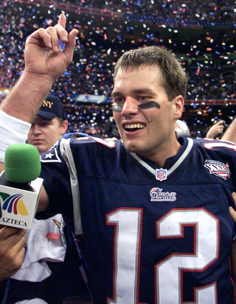 Brady celebrates his teams victory over the St. Louis Rams in 2002