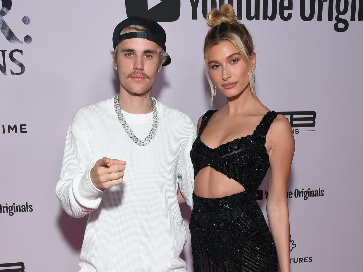 Justin Bieber reveals why he and Hailey are holding off having children  (AFP via Getty Images)