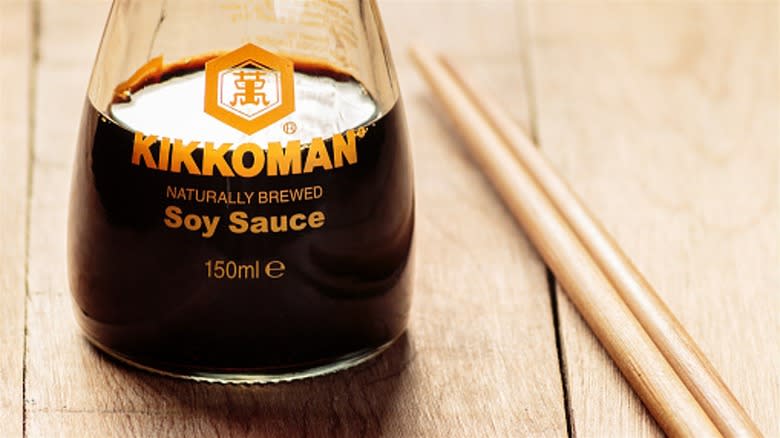 Half-empty bottle of Kikkoman soy sauce