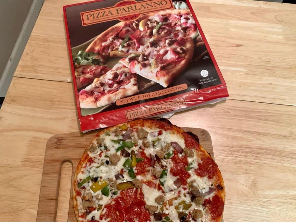 Trader JOe's parlanno pizza beside original box of it