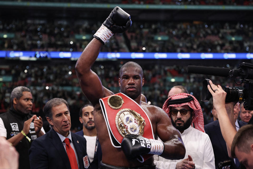 Britain's Daniel Dubois celebrates after defeating Britain's Anthony Joshua during their heavyweight boxing match for the IBF world title at Wembley Stadium in London on September 21, 2024.