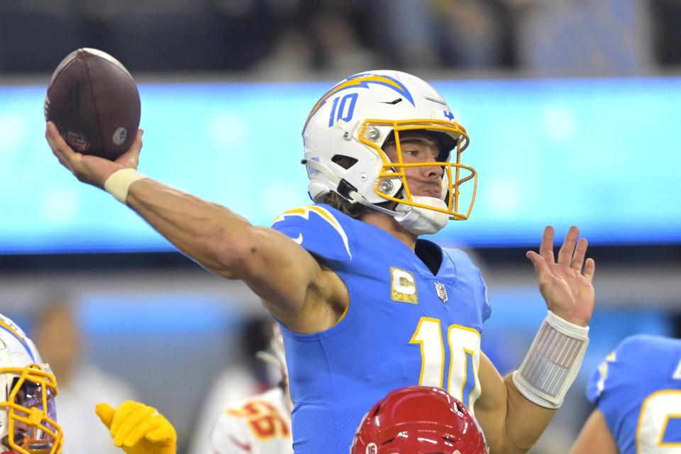 Los Angeles Chargers quarterback Justin Herbert passes during the first half of an NFL football game against the Kansas City Chiefs Sunday, Nov. 20, 2022, in Inglewood, Calif. (AP Photo/Jayne Kamin-Oncea)