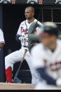 Atlanta Braves' Nick Markakis (22) waits in the dugout to bat in the first inning of a baseball game against the Toronto Blue Jays Thursday, Aug. 6, 2020, in Atlanta. Markakis was in the line up for the first time since rejoining the team a after he opted out of the season because of concerns over coronavirus. (AP Photo/John Bazemore)