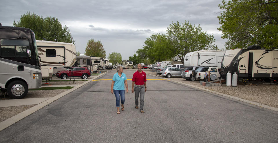 Jean and Duane Mathes take a walk through the Hi Valley RV Park in Eagle, Idaho.  (Photo: Kyle Green for HuffPost)