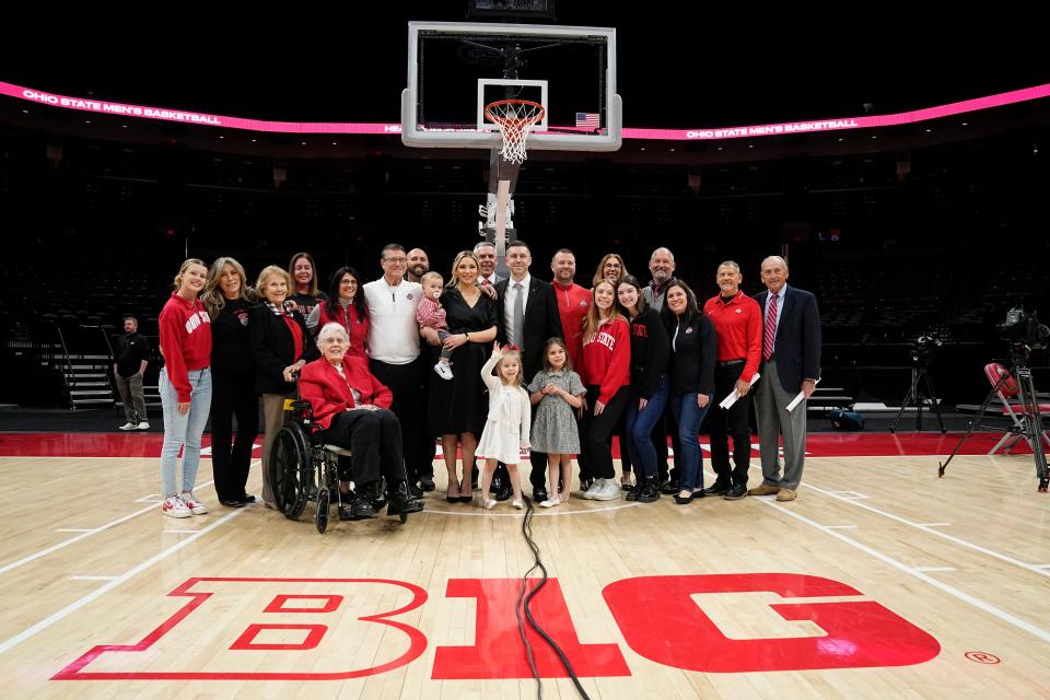 Mar 18, 2024; Columbus, OH, USA; Ohio State basketball head coach Jake Diebler stands with his family during his introductory press conference at Value City Arena.