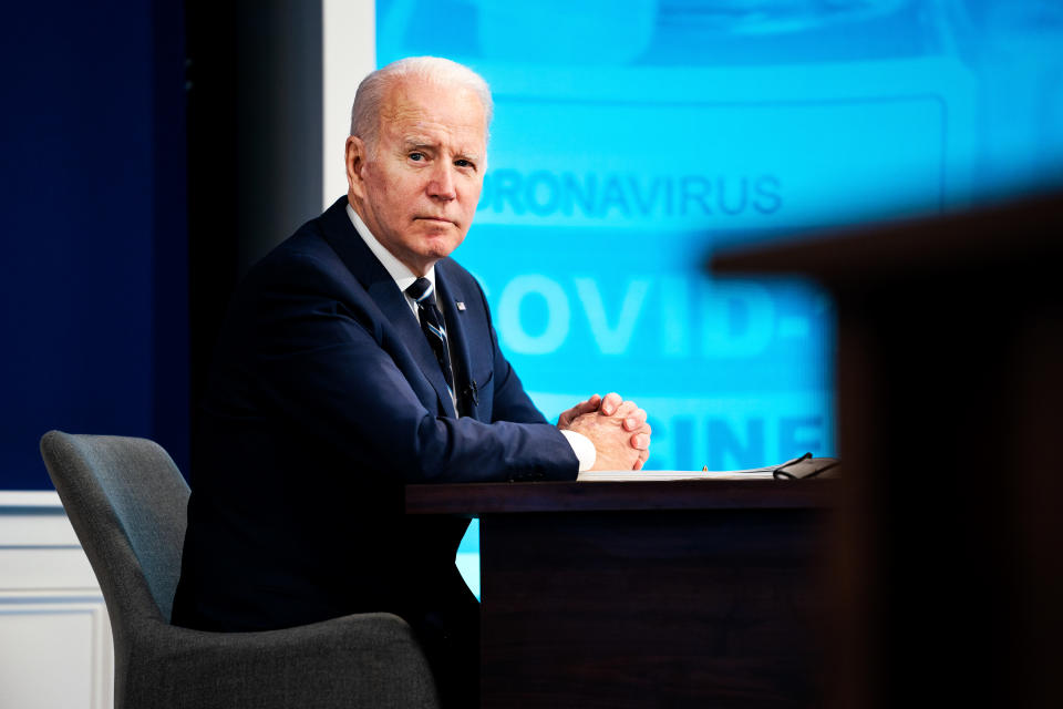 President Biden looks as members of the press shout questions during a COVID-19 response team meeting at the White House.