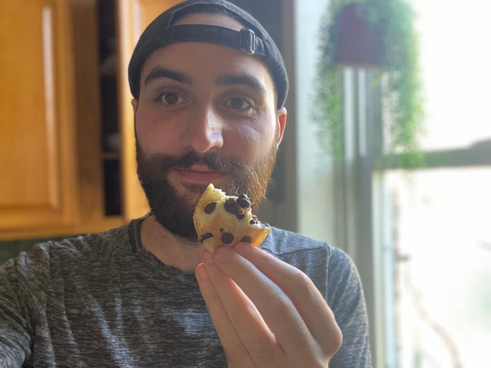 Frank holding up the pancake he made in the air fryer