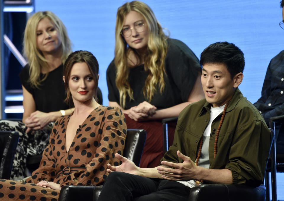 Jake Choi, right, a cast member in the Disney ABC television series "Single Parents," answers a question as fellow cast member Leighton Meester, front left, and co-creators/executive producers JJ Philbin, top left, and Elizabeth Meriwether look on during the 2018 Television Critics Association Summer Press Tour, Tuesday, Aug. 7, 2018, in Beverly Hills, Calif. (Photo by Chris Pizzello/Invision/AP)