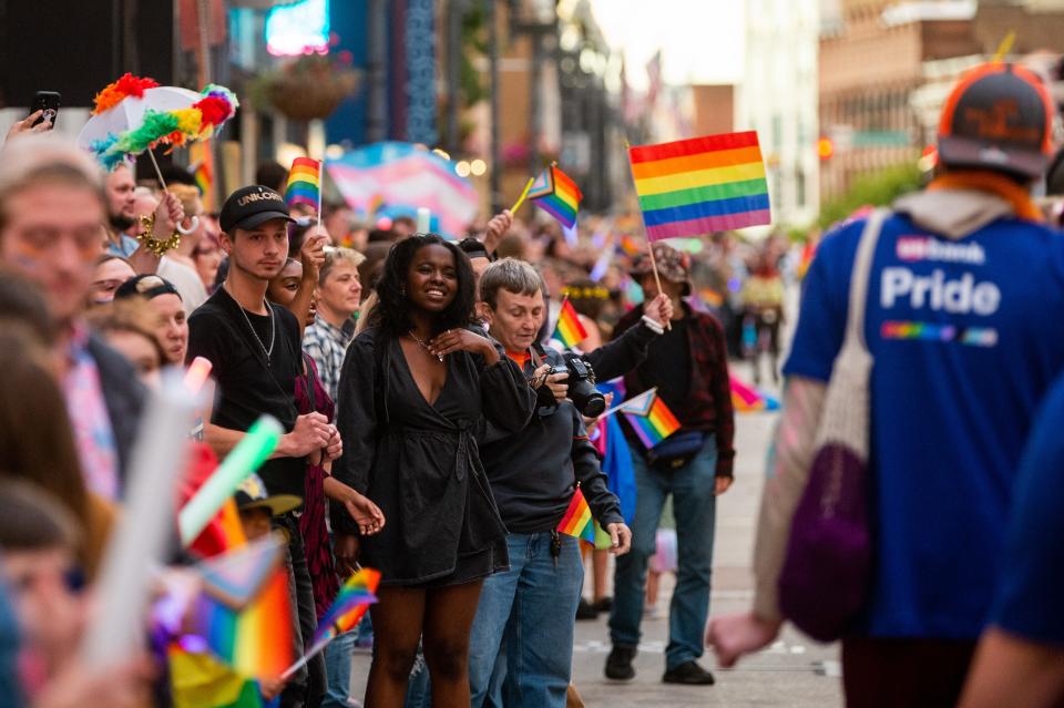 Pride flags are waved by paradegoers as the Knox Pride Parade parades down Gay Street in downtown Knoxville on Friday, Sept. 30, 2022. Knox Pride will continues its annual Pride Fest activities at World's Fair Park through Sunday, Oct. 2, 2022.