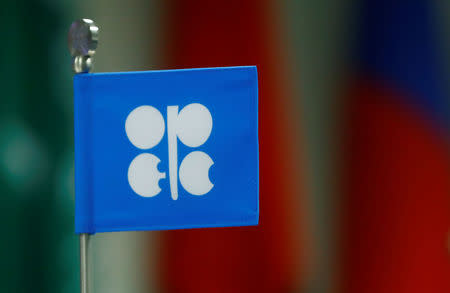 A flag with the Organization of the Petroleum Exporting Countries (OPEC) logo is seen during a meeting of OPEC and non-OPEC producing countries in Vienna, Austria September 22, 2017. REUTERS/Leonhard Foeger/Files