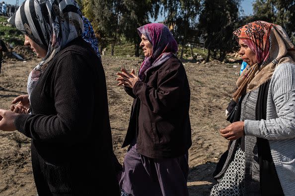 HATAY, TURKEY - FEBRUARY 10: Family members mourn during the funeral of a victim of the earthquake at mass graves on February 10, 2023 in Hatay, Turkey. A 7.8-magnitude earthquake hit near Gaziantep, Turkey, in the early hours of Monday, followed by another 7.5-magnitude tremor just after midday. The quakes caused widespread destruction in southern Turkey and northern Syria and were felt in nearby countries. (Photo by Burak Kara/Getty Images)