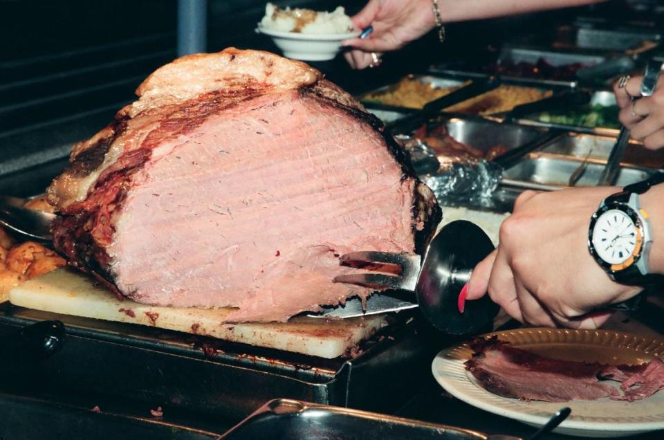 Carving the meat at Piccadilly. Miami Herald File