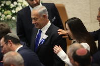 Israel's Likud Party leader Benjamin Netanyahu arrives during the swearing-in ceremony for Israeli lawmakers at the Knesset, Israel's parliament, in Jerusalem, Tuesday, Nov. 15, 2022. Israeli lawmakers were sworn in at the Knesset, on Tuesday, following national elections earlier this month. (Abir Sultan/Pool Photo via AP)