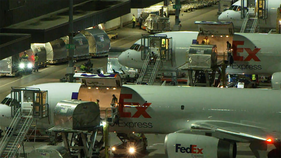 Every day 15 million packages are moved through one of FedEx's transit hubs.  / Credit: CBS News