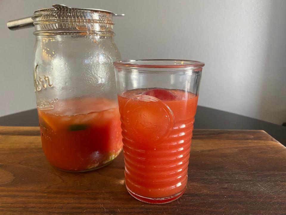 Bloody Marys in a glassa and a mason jar.