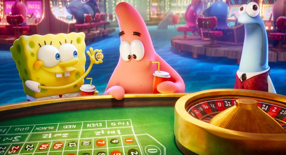 SpongeBob (voiced by Tom Kenny, left) and Patrick (Bill Fagerbakke) hit the roulette table in the Lost City of Atlantic City in "The SpongeBob Movie: Sponge on the Run."