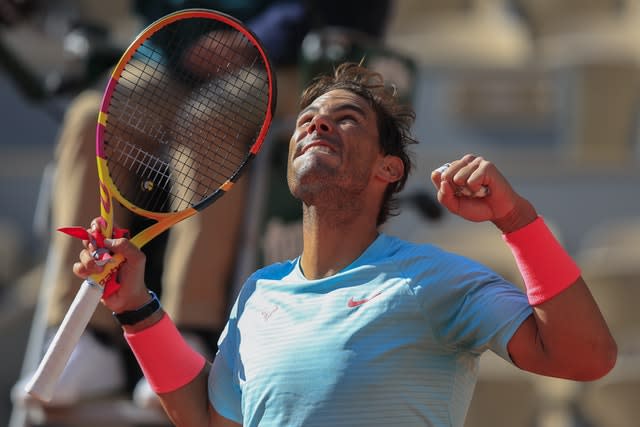 Rafael Nadal punches the air after beating Sebastian Korda