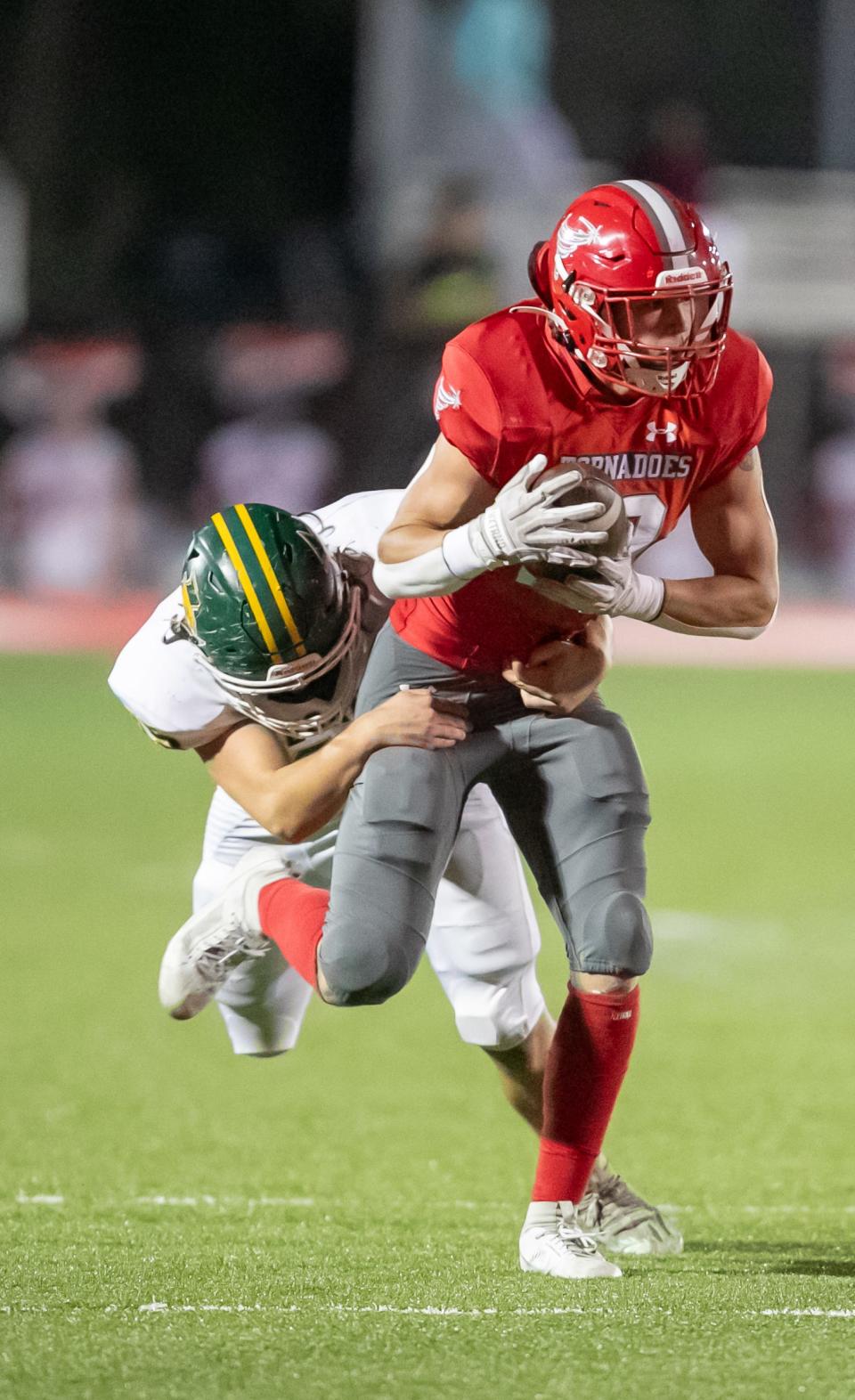 Lecanto Eli Pace (45) tries to stop Bradford Chason Clark (10) as Bradford takes on Lecanto at Bradford High School in Starke, FL on Friday, October 20, 2023. [Alan Youngblood/Gainesville Sun]