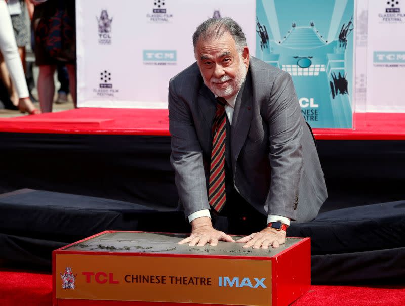 FILE PHOTO: Director Coppola places his handprints in cement during a ceremony in the forecourt of the TCL Chinese theatre in Hollywood