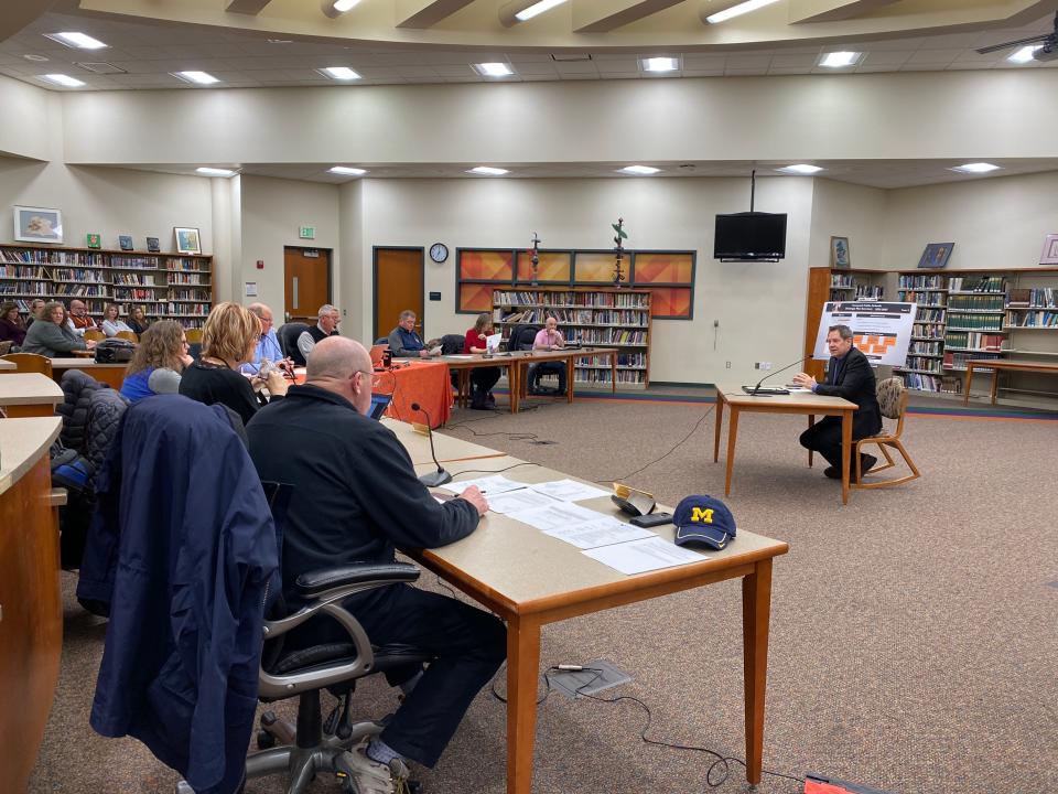 Rodney Green of the Michigan Association of School Boards, right, discusses the superintendent search timeline with the Tecumseh Board of Education Jan. 10.