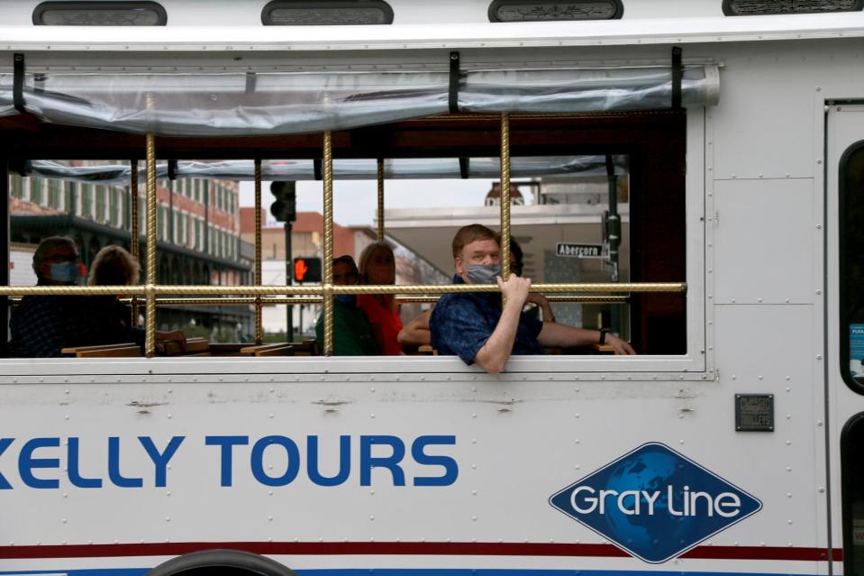 A trolley tour makes its way across Broughton Street.