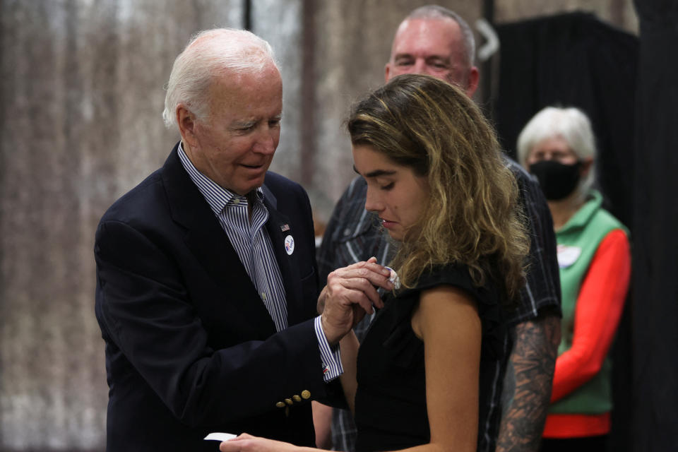 U.S. President Joe Biden reacts after casting his vote during early voting for the 2022 U.S. midterm elections with his granddaughter Natalie, a first-time voter, at a polling station in Wilmington, Delaware, U.S. October 29, 2022. REUTERS/Tasos Katopodis/Pool