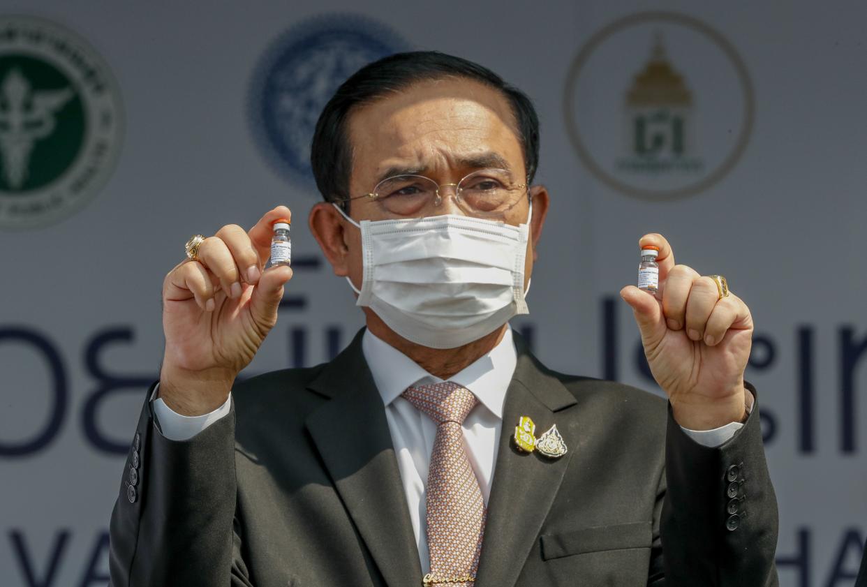 Prime Minister Prayuth Chan-ocha holds samples of Sinovac vaccine during a ceremony to mark the arrival of 200,000 doses of the Sinovac vaccine at Suvarnabhumi airport in Bangkok, Thailand on Wednesday, Feb. 24, 2021. Thailand is scheduled to receive the first shipments of 200,000 doses of the Sinovac vaccine and 117,000 doses of the AstraZeneca vaccine on Feb. 24.