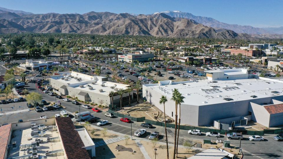 A long line of cars queue along a retail driveway near the new In-N-Out, upper left, in Rancho Mirage, January 7, 2022.