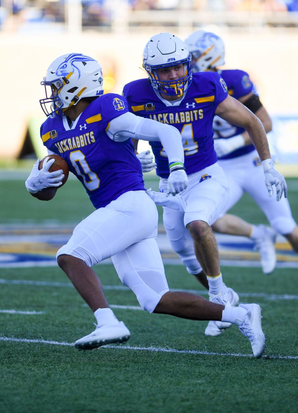 South Dakota State's Daeton Mcgaughy runs the ball after making an interception in a game against UC-Davis on Saturday, September 10, 2022, at Dana J. Dykhouse Stadium in Brookings.