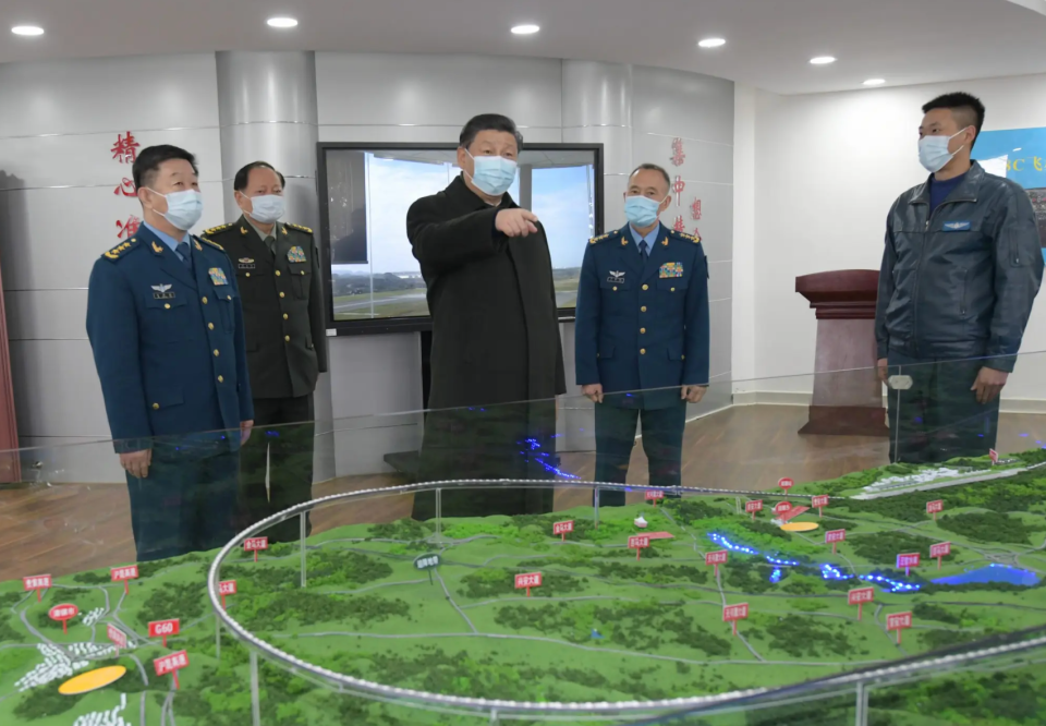 Chinese President Xi Jinping, also general secretary of the Communist Party of China CPC Central Committee and chairman of the Central Military Commission CMC, learns about the training of soldiers and officers during a visit to a PLA unit in southwestern Guizhou Province. <em>Xinhua/Li Gang via Getty Images</em>