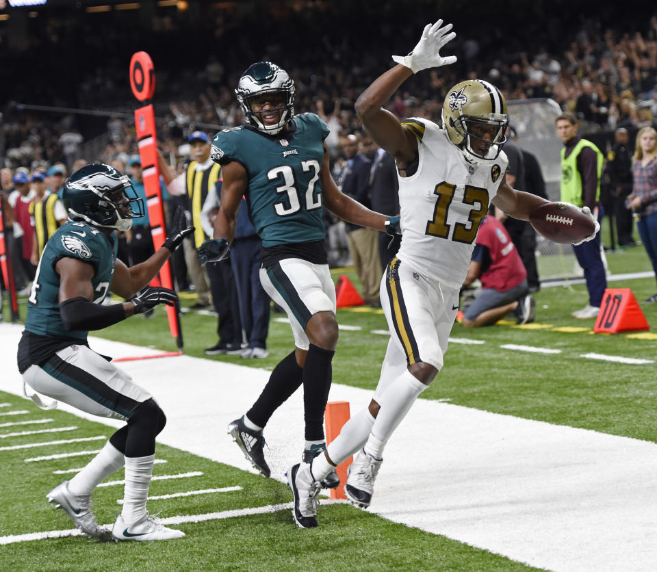 h=13= crosses into the end zone in front of Philadelphia Eagles cornerback Rasul Douglas (32) and free safety Corey Graham on a touchdown reception in the second half of an NFL football game in New Orleans, Sunday, Nov. 18, 2018. (AP Photo/Bill Feig)
