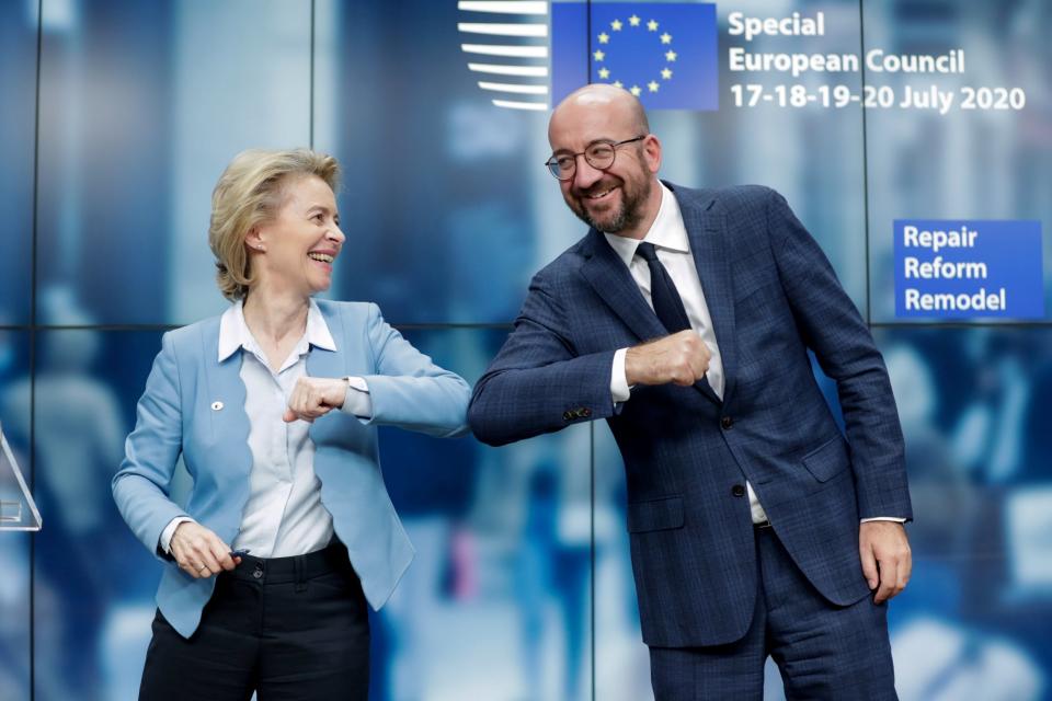 European Council President Charles Michel and European Commission President Ursula Von Der Leyen do an elbow bump at the end of a news conference (Reuters)