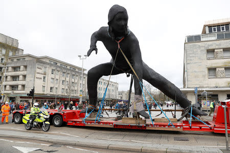 Britain's largest bronze sculpture, "Messenger" is driven to Plymouth Theatre Royal through the city centre in Plymouth, Britain, March 18, 2019. REUTERS/Peter Nicholls