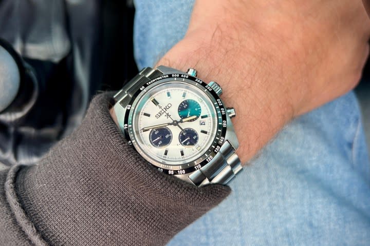 A person wearing the Seiko Speedtimer watch.
