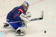 Unted States' goalkeeper Trey Augustine makes a save during the preliminary round match between United States and Germany at the Ice Hockey World Championships in Ostrava, Czech Republic, Saturday, May 11, 2024. (AP Photo/Darko Vojinovic)