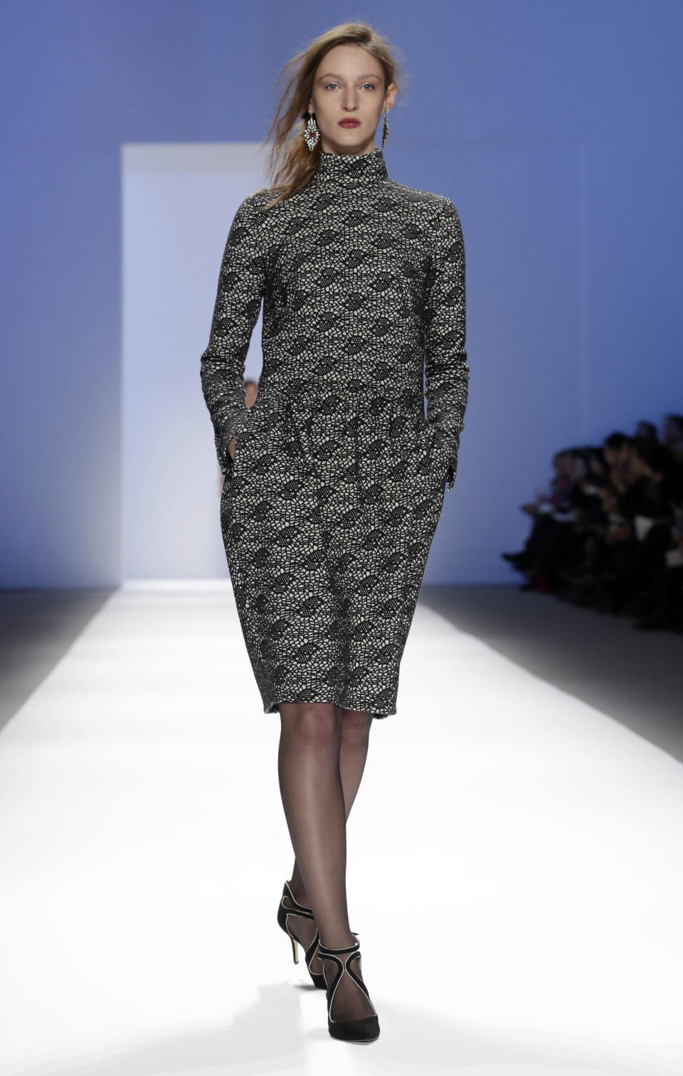 The Tadashi Shoji Fall 2013 collection is modeled during Fashion Week in New York on Thursday, Feb. 7, 2013. (AP Photo/Richard Drew)