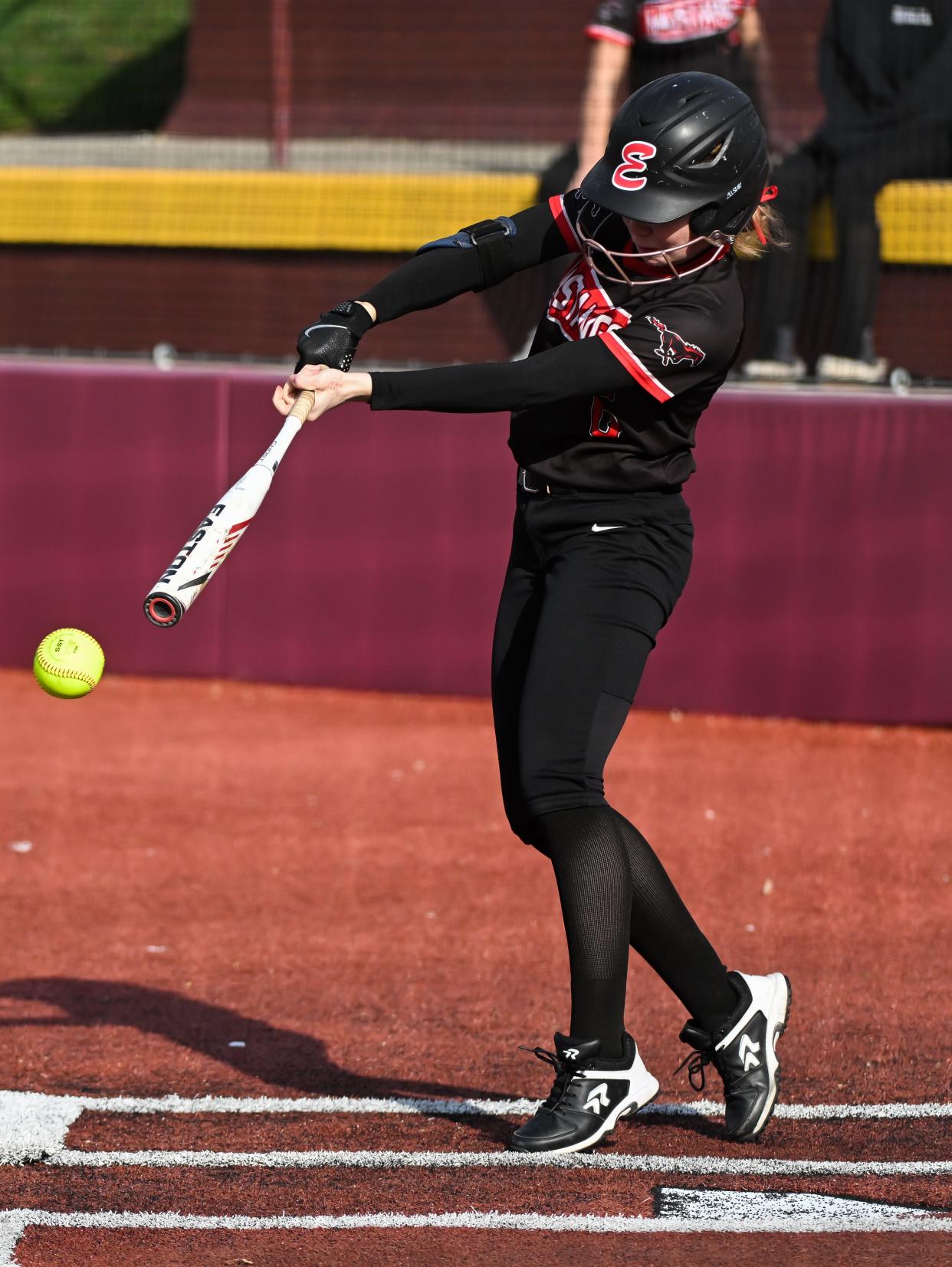 Edgewood’s Alli Bland hits the ball during the softball game at Bloomington North on Tuesday, March 26, 2024.