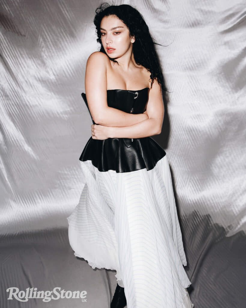 Charli wears dress and boots by Louis Vuitton (Picture: Tyrell Hampton)