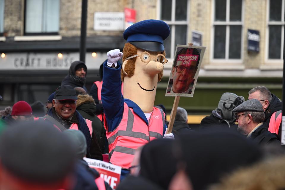 A demonstrator dresses as Postman Pat at Parliament Square rally (Leon Neal/Getty Images)