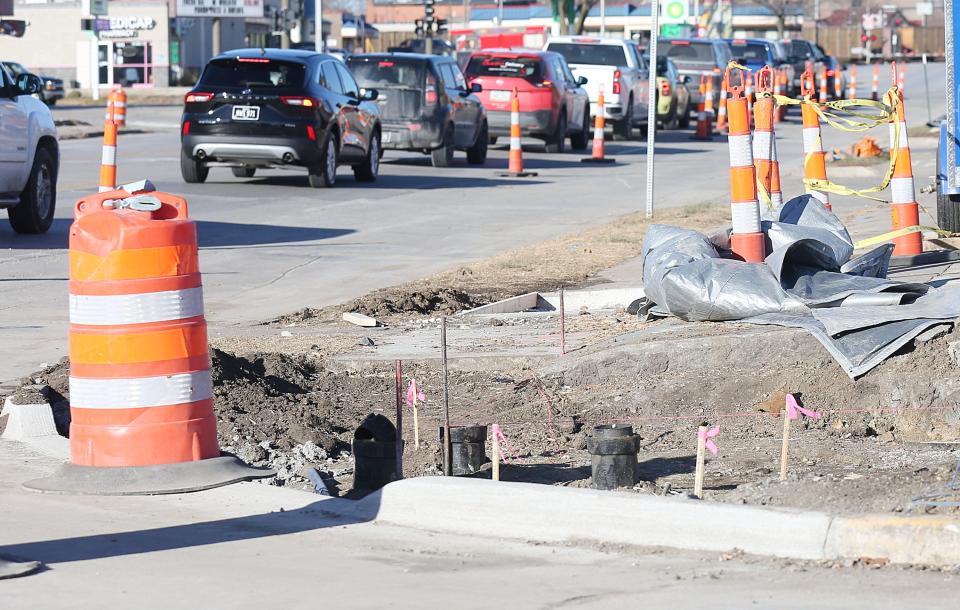 Lanes closed due to the construction of sanitary sewer on Duff Ave on Monday, Dec. 18, 2023, in Ames, Iowa.