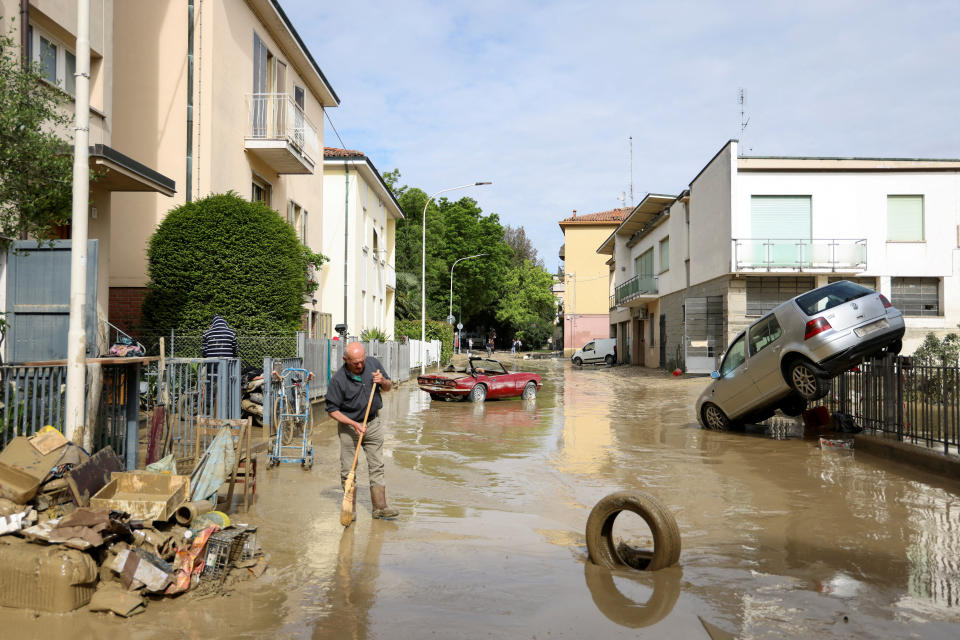 Many have begun the long job of cleaning up. (Reuters)