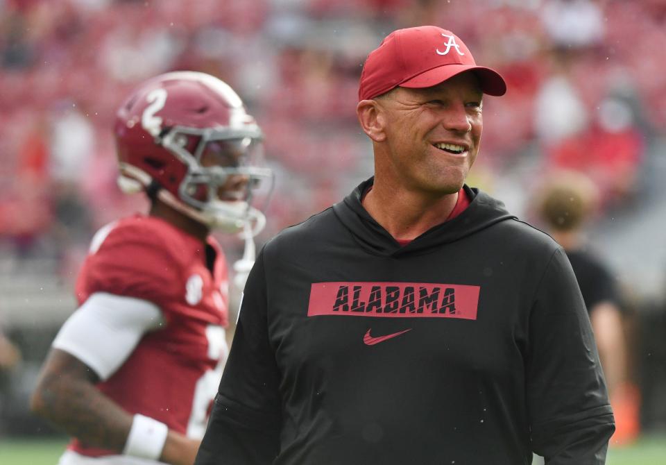 Aug 31, 2024; Tuscaloosa, Alabama, USA; Alabama Crimson Tide head coach Kalen DeBoer watches his team warm up in Bryant-Denny Stadium before the game between the Alabama Crimson Tide and the Western Kentucky Hilltoppers. This is DeBoer’s first game as Crimson Tide head coach. Mandatory Credit: Gary Cosby Jr.-USA TODAY Sports