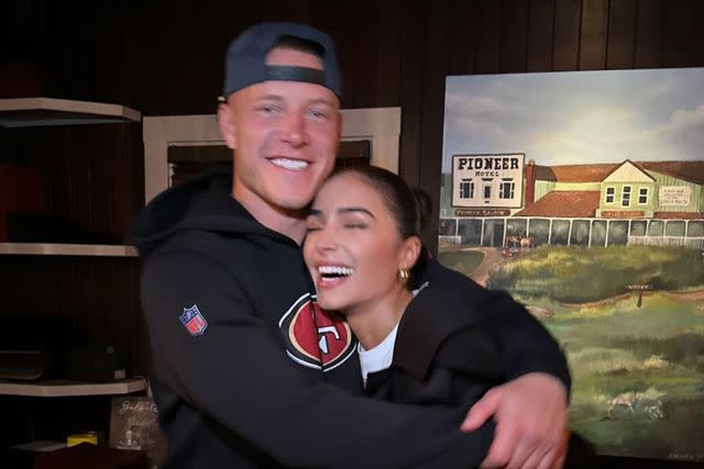 <p>Olivia Culpo/Instagram</p> Christian McCaffrey (left) photographed celebrating a 49ers win with Olivia Culpo