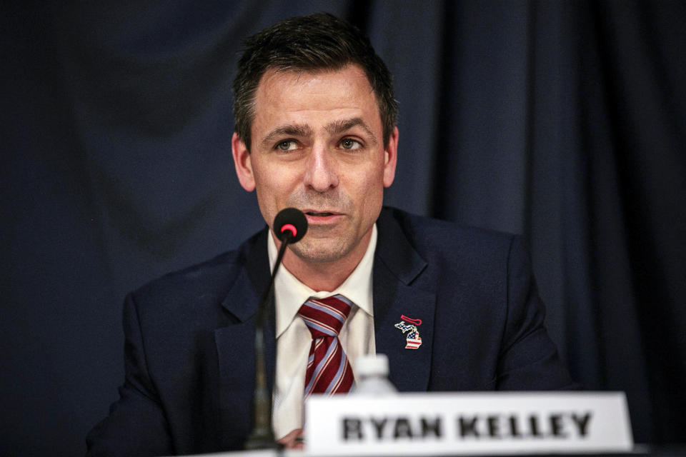 FILE - Ryan Kelley, a Republican candidate for Michigan governor, speaks during a rally outside the Michigan Capitol in Lansing, Mich., Tuesday, Feb. 8, 2022. Several little-known conservatives are in a tight Republican primary for Michigan governor, with no clear frontrunner to try to oust first-term Democratic Gov. Gretchen Whitmer in November 2022. None of the five GOP candidates seeking the party's nomination, Tuesday, Aug. 2, 2022, has been elected to public office before. (Jake May/The Flint Journal via AP, File)