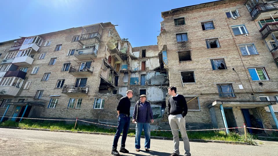 Horenka resident Ivan Bilotserkivets explains how his town was shelled in the first days of the invasion as Russia attacked Kyiv. - Svitlana Vlasova/CNN